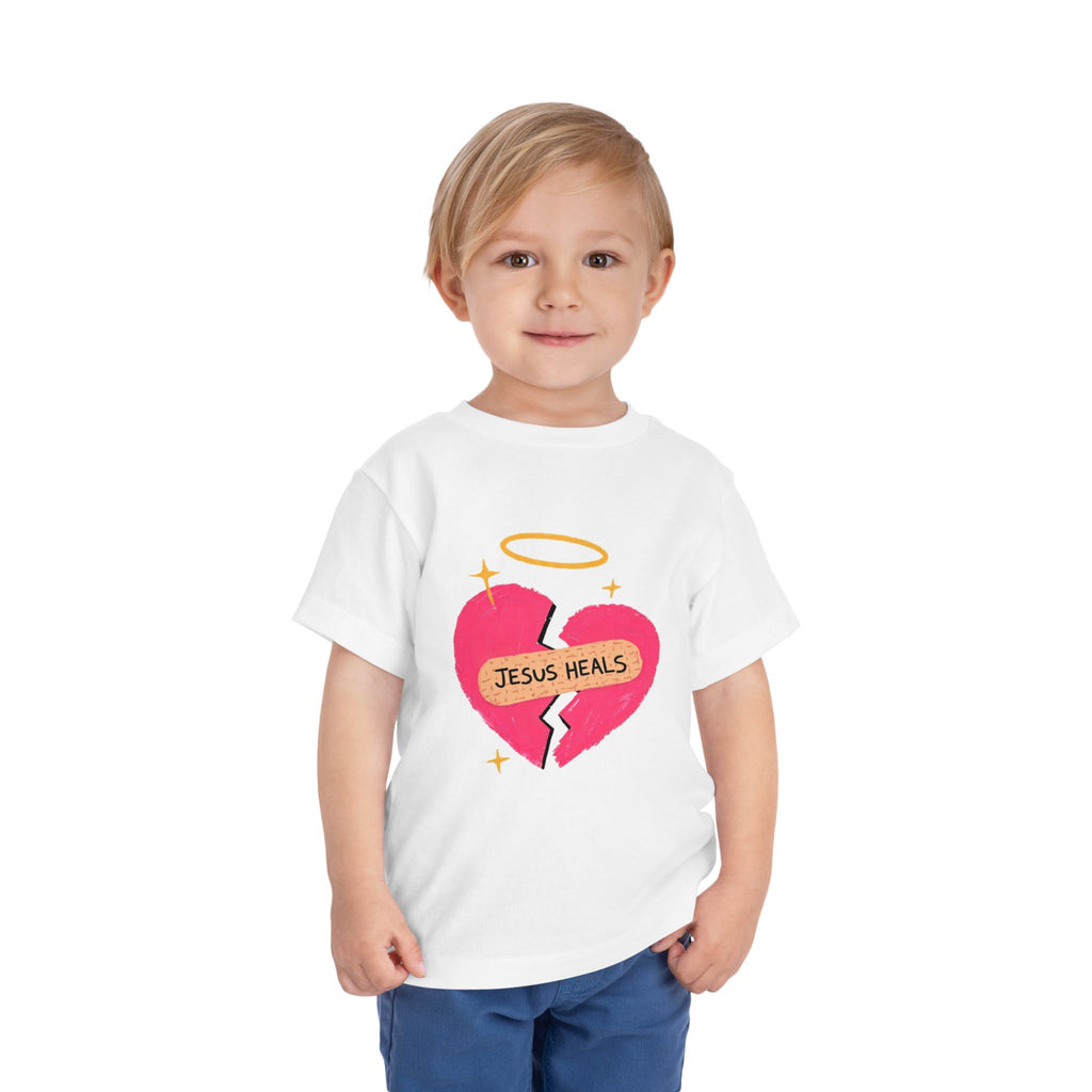 Toddler Tee — "Jesus Heals" Heart Graphic Christian Kids Shirt